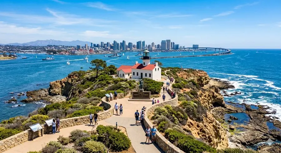 Cabrillo National Monument lighthouse at Point Loma with San Diego skyline